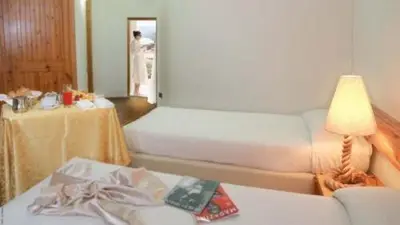 Letto o letti in una camera di Hotel Pop
