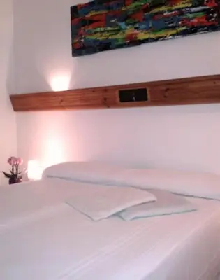 Letto o letti in una camera di Hotel Pop