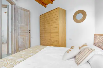 Letto o letti in una camera di Villa BRANDINCHI - Heated Pool, Private Beach, Sea View, Wi-Fi