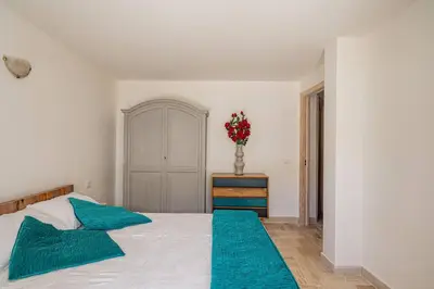 Letto o letti in una camera di Seafront Villa - 5min to BRANDINCHI I Exclusive Garden I Private Beach I BBQ I Wi-Fi