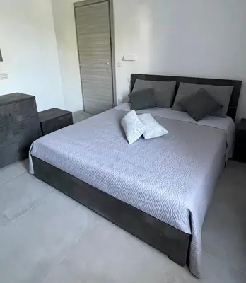 Letto o letti in una camera di L'isola felice