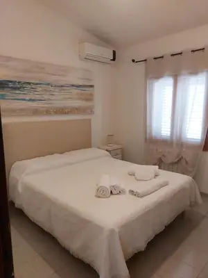 Letto o letti in una camera di Da Anna