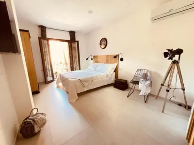 Letto o letti in una camera di B&B Dimora Dorgali