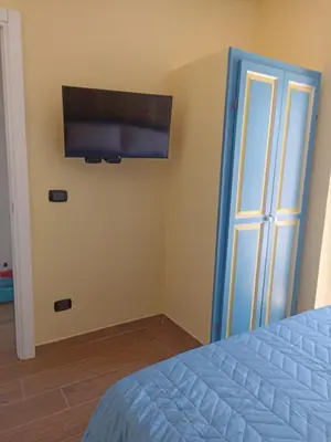 Letto o letti in una camera di Sa Domo holorada 1 e 2