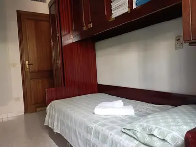 Letto o letti in una camera di Domus Garden