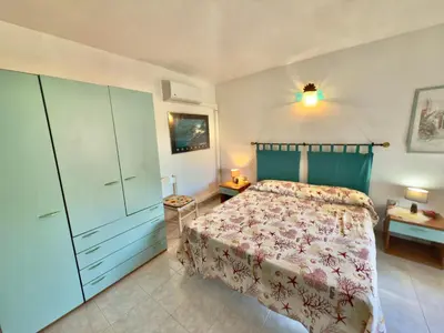 Letto o letti in una camera di Appartamenti San Teodoro