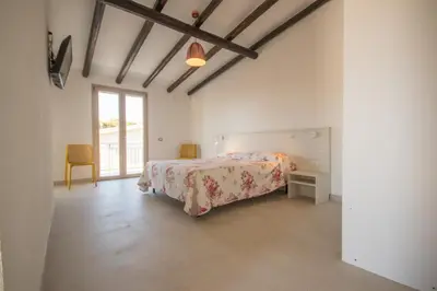Letto o letti in una camera di Conchiglia Sud