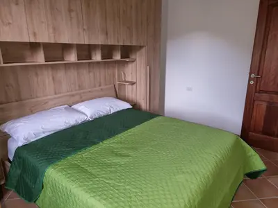 Letto o letti in una camera di Villetta La Cinta