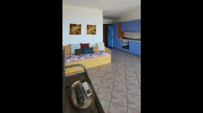 Letto o letti in una camera di Appartamento - Villaggio Terrata- Golfo Aranci