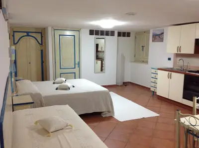 Letto o letti in una camera di Addisora Appartamenti