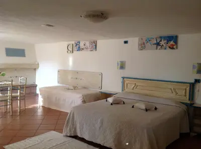 Letto o letti in una camera di Addisora Appartamenti