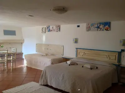 Letto o letti in una camera di Addisora Appartamenti