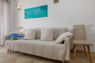 Area soggiorno di Appartamento Smeralda - SHERDENIA Luxury Apartments