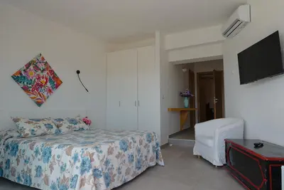 Letto o letti in una camera di Rooms, affittacamere Maksim