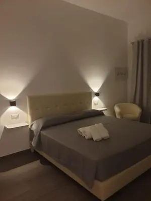 Letto o letti in una camera di CAVOUR ROOMS
