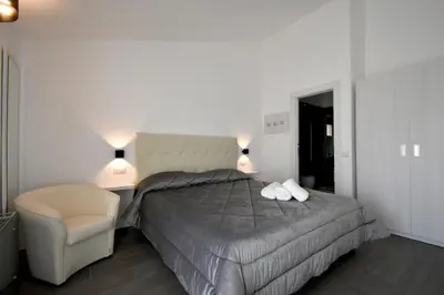 Letto o letti in una camera di CAVOUR ROOMS