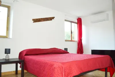 Letto o letti in una camera di Appartamento Orticello