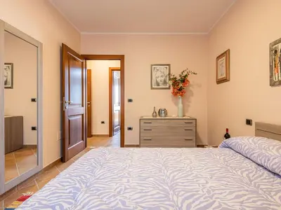 Letto o letti in una camera di casa anna
