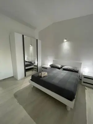 Letto o letti in una camera di Casa Miele