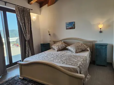 Letto o letti in una camera di B&b La Casa Nel Vento