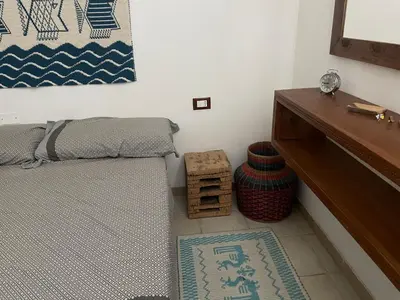 Letto o letti in una camera di Sardinia House