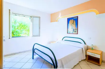 Letto o letti in una camera di Orosei RE - Villa Osala - 800 m dal mare