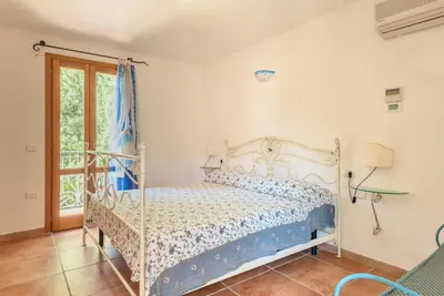 Letto o letti in una camera di Residence Bouganvillage