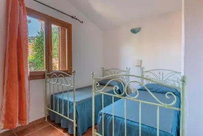 Letto o letti in una camera di Residence Bouganvillage