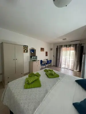 Letto o letti in una camera di CASA MONELLA mono locale vista mare