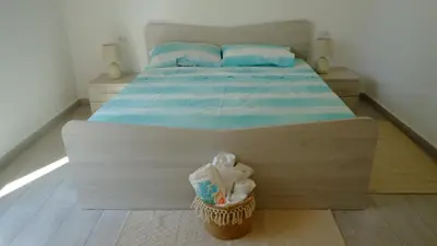 Letto o letti in una camera di Villetta La Caletta