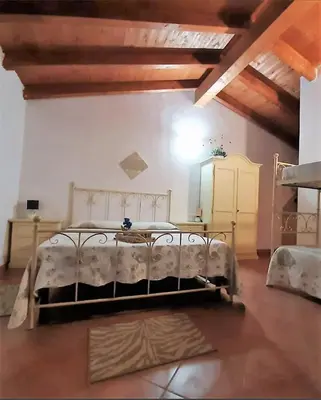 Letto o letti in una camera di Donnigheddu
