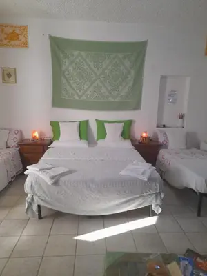 Letto o letti in una camera di GIARDINO DEL SOLE