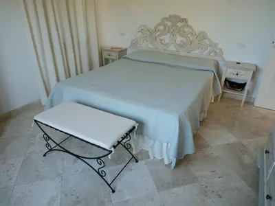 Letto o letti in una camera di Villa Alba Chiara
