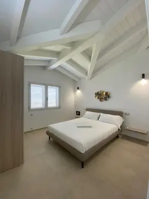 Letto o letti in una camera di Villa Lorisa