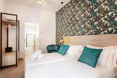 Letto o letti in una camera di Lungomare Rooms