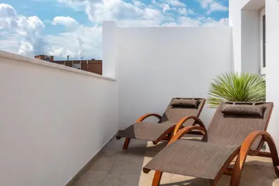 Area soggiorno di Lungomare Rooms
