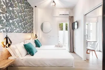 Letto o letti in una camera di Lungomare Rooms