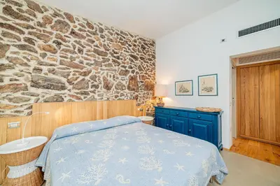 Letto o letti in una camera di Casa Loris by Wonderful Italy