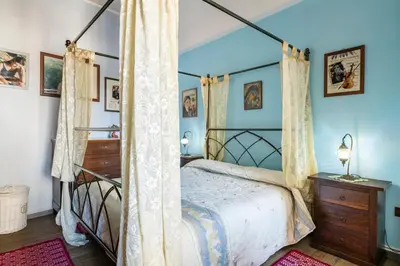 Letto o letti in una camera di Piccolo e intimo centro città