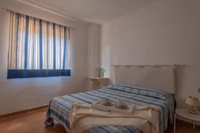Letto o letti in una camera di Baia De Bahas Bilo VM 500m From The Sea - Happy Rentals