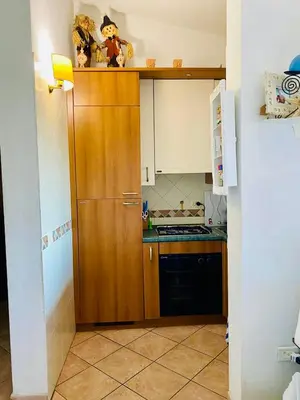 Cucina o angolo cottura di Villetta con giardino a due passi dal Mare - 6 posti letto - Porto Taverna