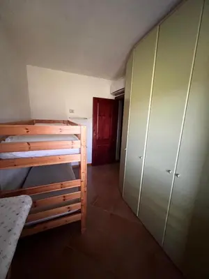 Letto o letti in una camera di Schiera La Primula