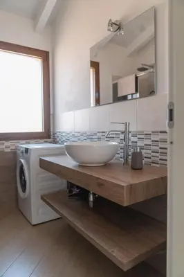 Cucina o angolo cottura di Waterfront apartment Olbia