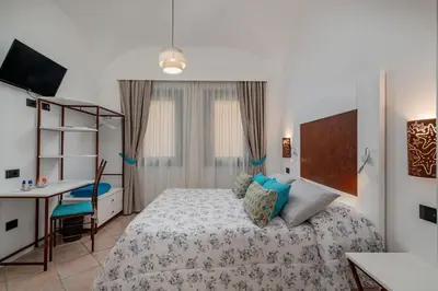 Letto o letti in una camera di Sorella Luna Room Boutique, Centro di Olbia