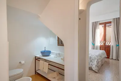 Letto o letti in una camera di Sorella Luna Room Boutique, Centro di Olbia