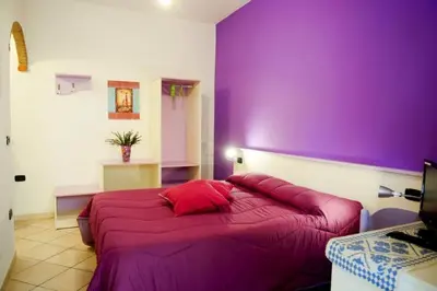 Letto o letti in una camera di Affittacamere Casa del Sole
