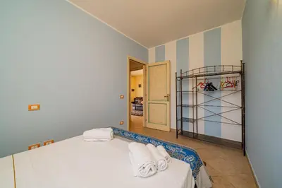 Letto o letti in una camera di Casa Hermes by Wonderful Italy