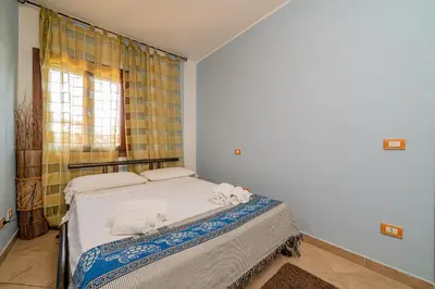 Letto o letti in una camera di Casa Hermes by Wonderful Italy