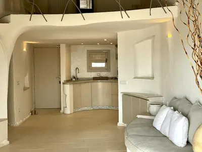 Cucina o angolo cottura di SAN TEODORO PUNTA EST FANTASTICO TRILOCALE VISTA MARE
