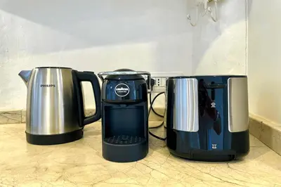 Set per la preparazione di tè e caffè presso SAN TEODORO PUNTA EST FANTASTICO TRILOCALE VISTA MARE
